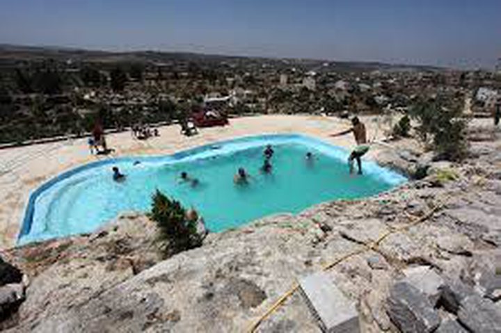 A Palestinian Family Converts a cave into a swimming pool to Escape the Summer heat.
